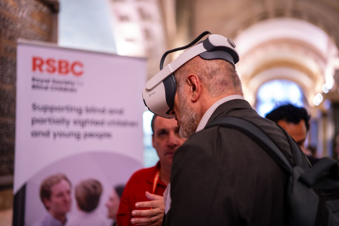 An attendee experiencing the Empatheyes VI simulation headset