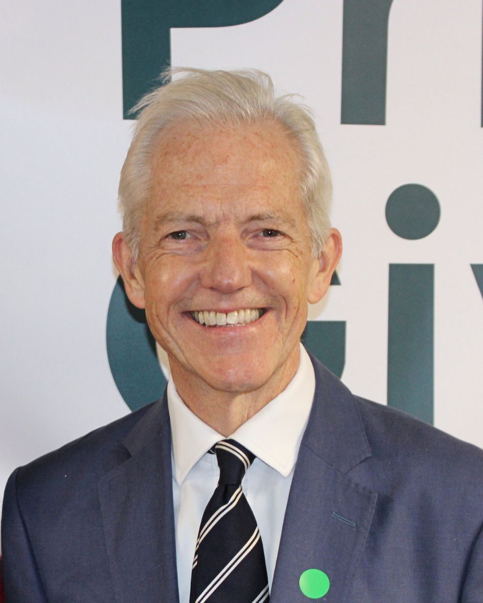 Our Chair of Trustees, Patrick Plant, smiling at the camera
