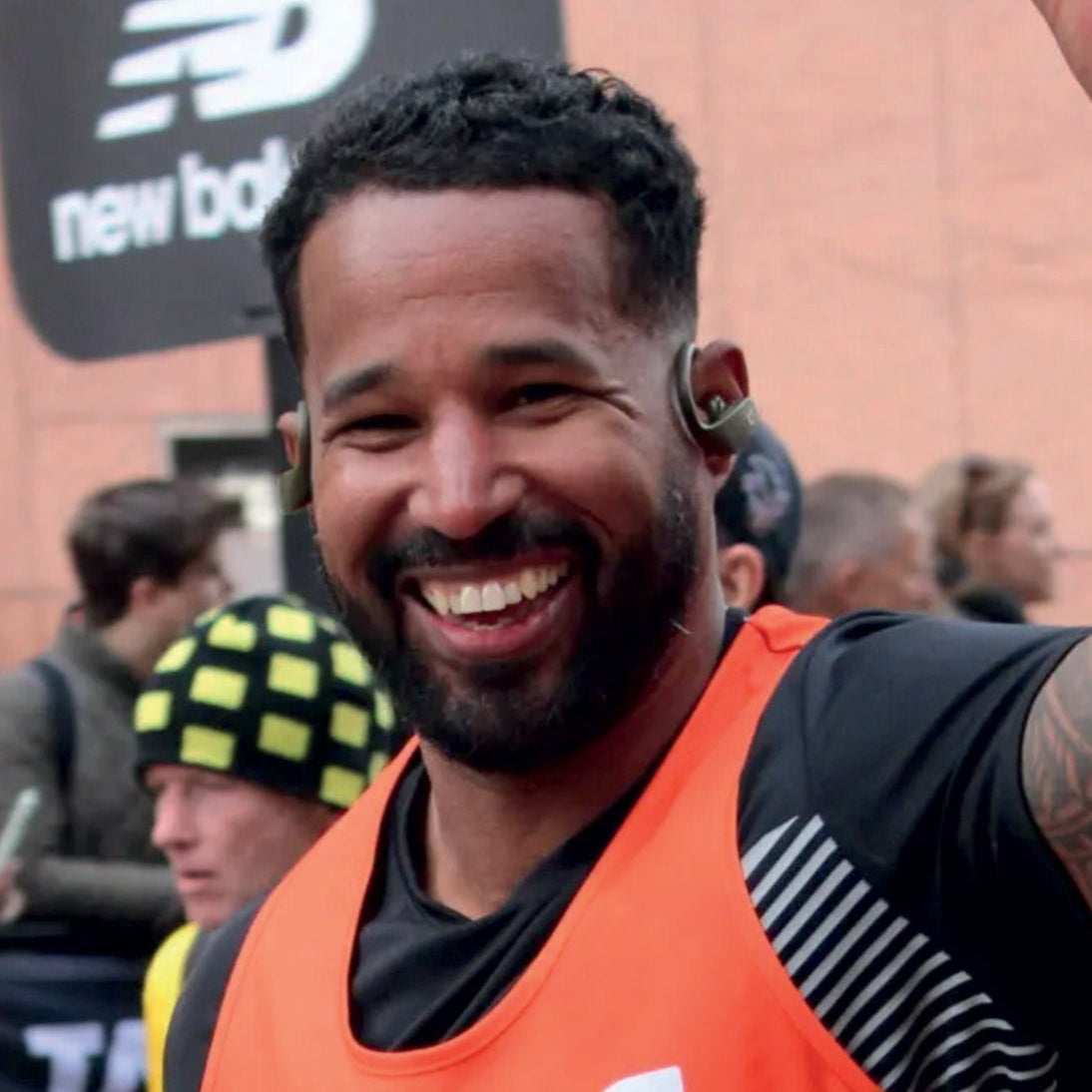 A smiling, triumphant London Marathon runner 