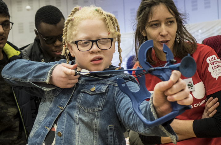 An image of a girl practicing archery