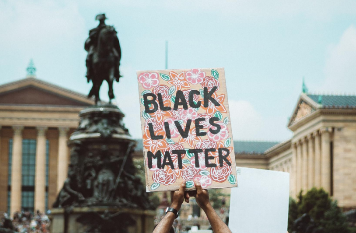 A photo of a sign with 'Blacks Lives Matter' on it